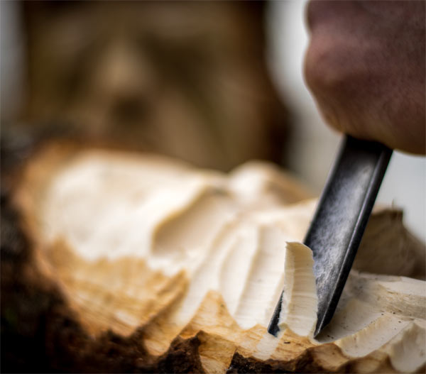 carving a wood spirit